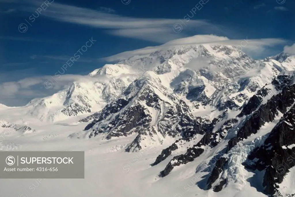 A Lenticular Cloud Envelops The Summit Of Alaska's Mount McKinley, North America's Highest Point