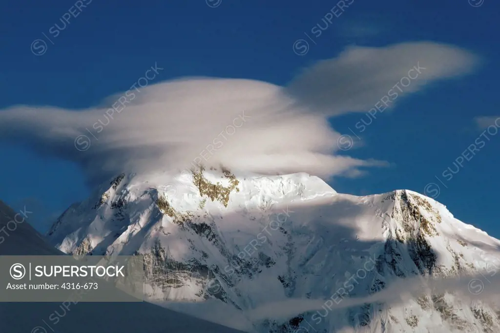 Lenticular Cloud Cap Engulfs the Summit Ramparts of Mount Hunter