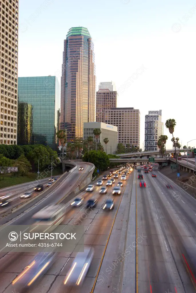 Traffic moving on a freeway at dusk, California State Route 110, Los Angeles, California, USA