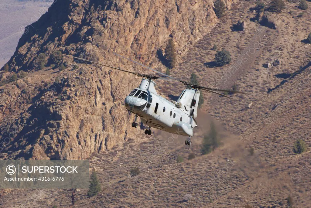 US Marine Corps CH-46 Sea Knight makes a final landing approach to an expeditionary airfield at the Marine Corps Mountain Warfare Training Center, Bridgeport, California, USA