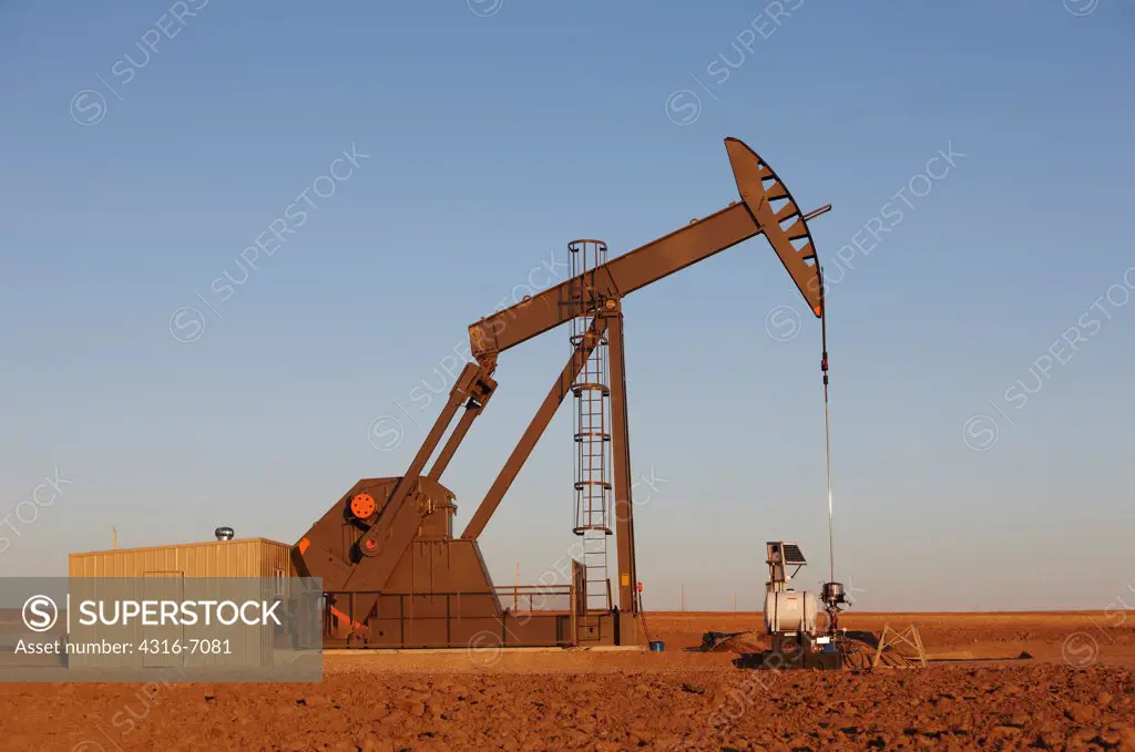 Oil well pumpjack in the eastern plains of Colorado, USA