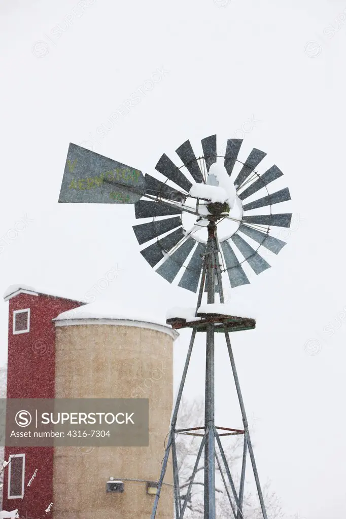 USA, Colorado, Windmill in snow storm