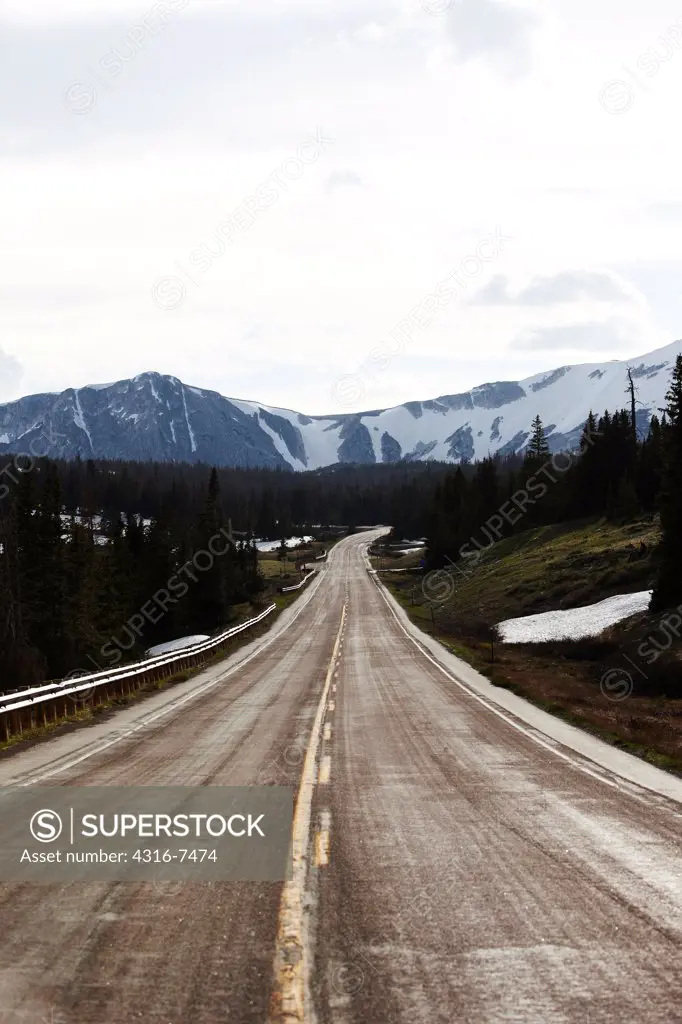Road through mountains, Wyoming. Wyoming Route 130, through the Snowy Range, Medicine Bow Mountains