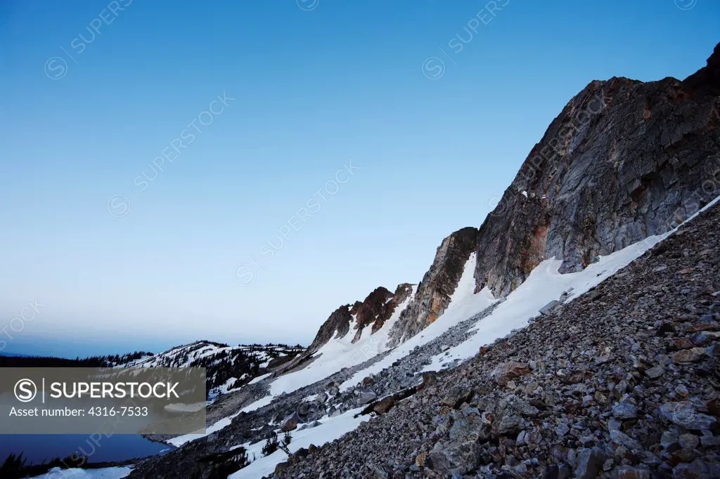 At the base of high, steep mountains, Lake Marie, Snowy Range of the Medicine Bow Mountains, southern Wyoming