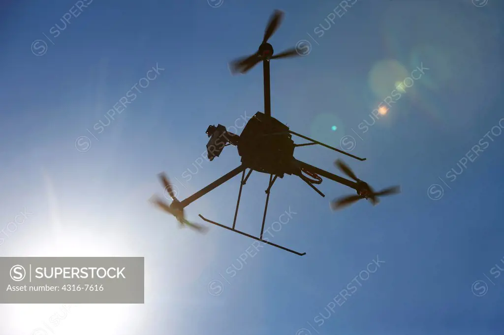 Prototype, experimental unmanned aerial vehicle, (UAV), or drone, flying.