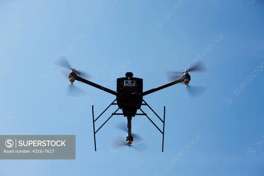 Prototype, experimental unmanned aerial vehicle, (UAV), or drone, flying.