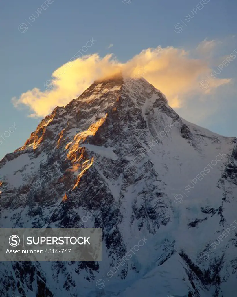 Clouds Ring the Summit of K2 At Sunset