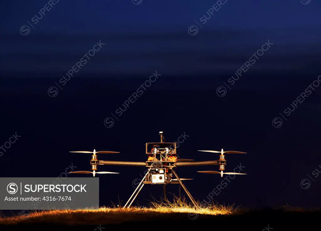 Small unmanned aerial vehicle (UAV), Also called drone, Prepared for launch, Night view