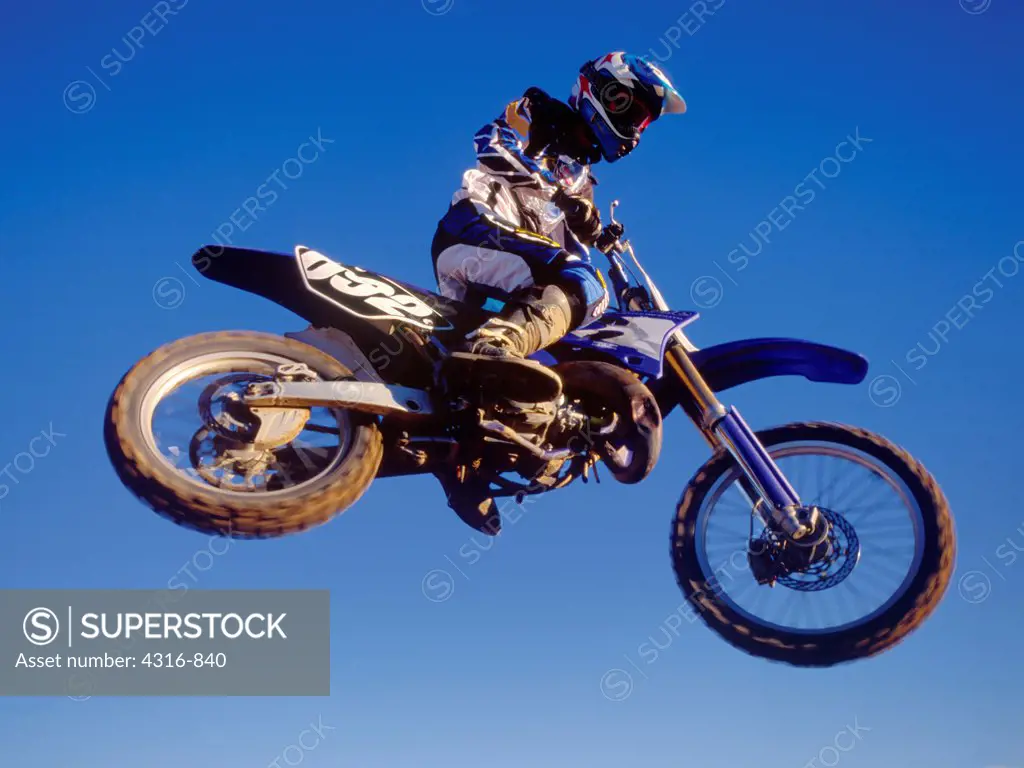 A Dirt Bike Rider Wrangles with Gravity