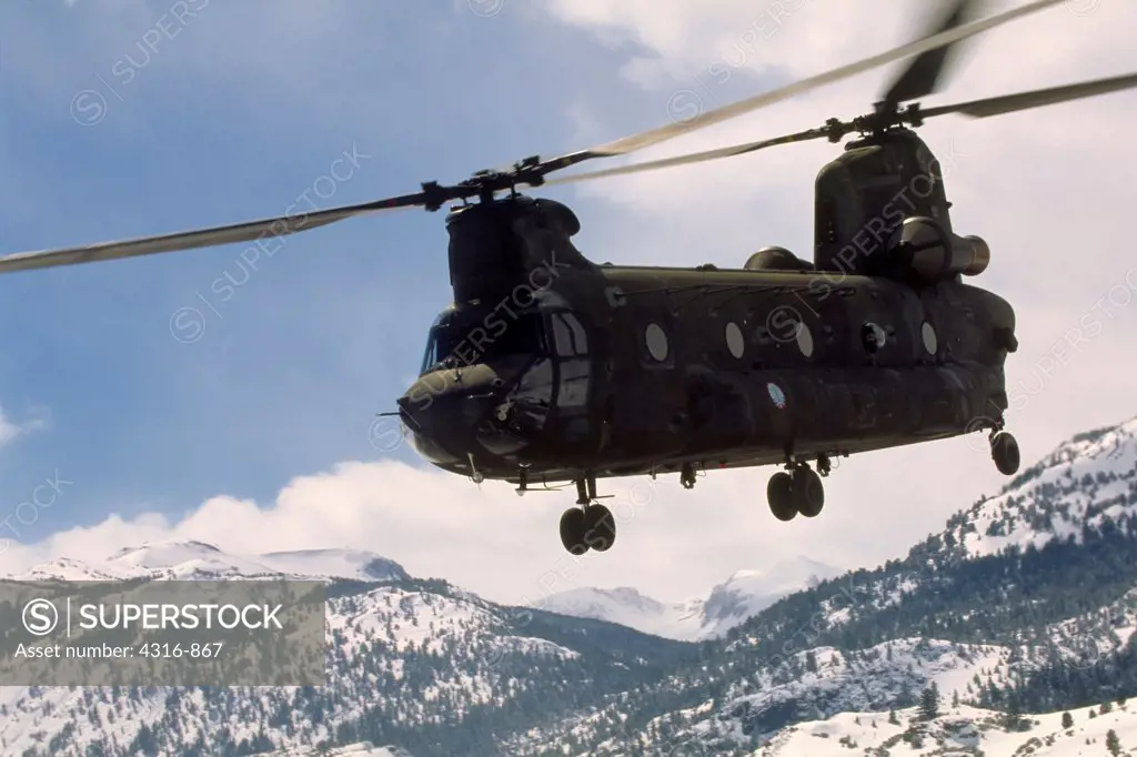 A CH-47 Chinook Roars Through the Cold Mountain Air