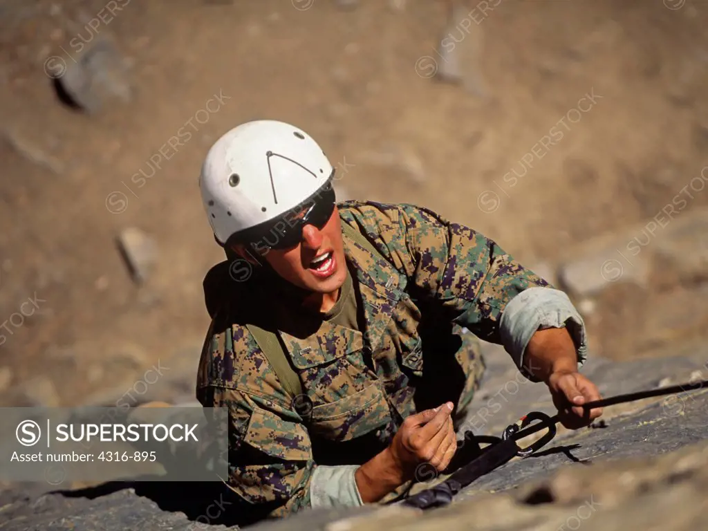 A US Marine Practices Rock Climbing