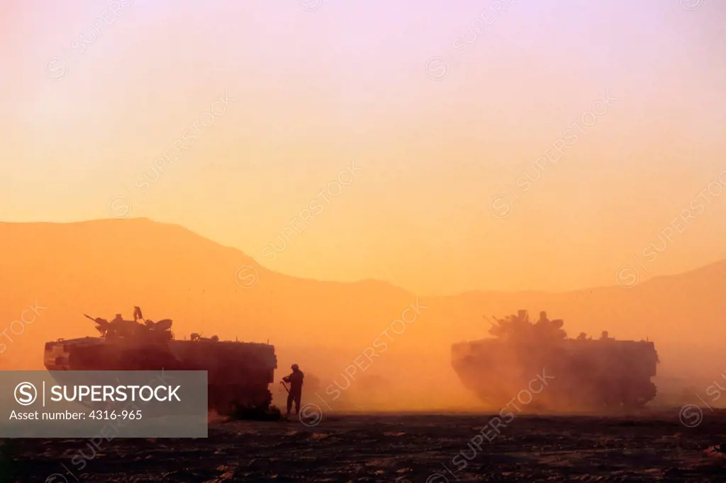 US Marine Corps Amphibious Assault Vehicles at Sunset