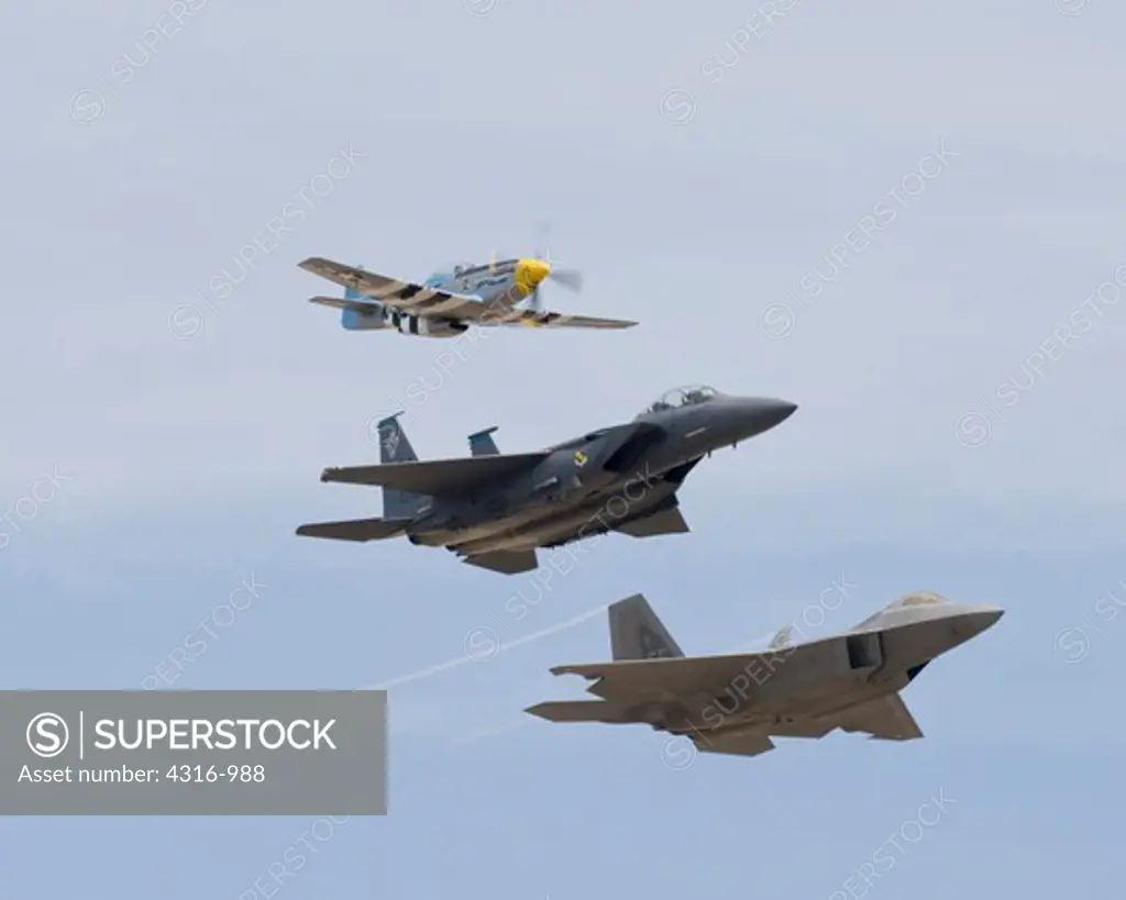 P-51D Mustang, F-15E Strike Eagle, and F-22 Raptor in Tight Formation