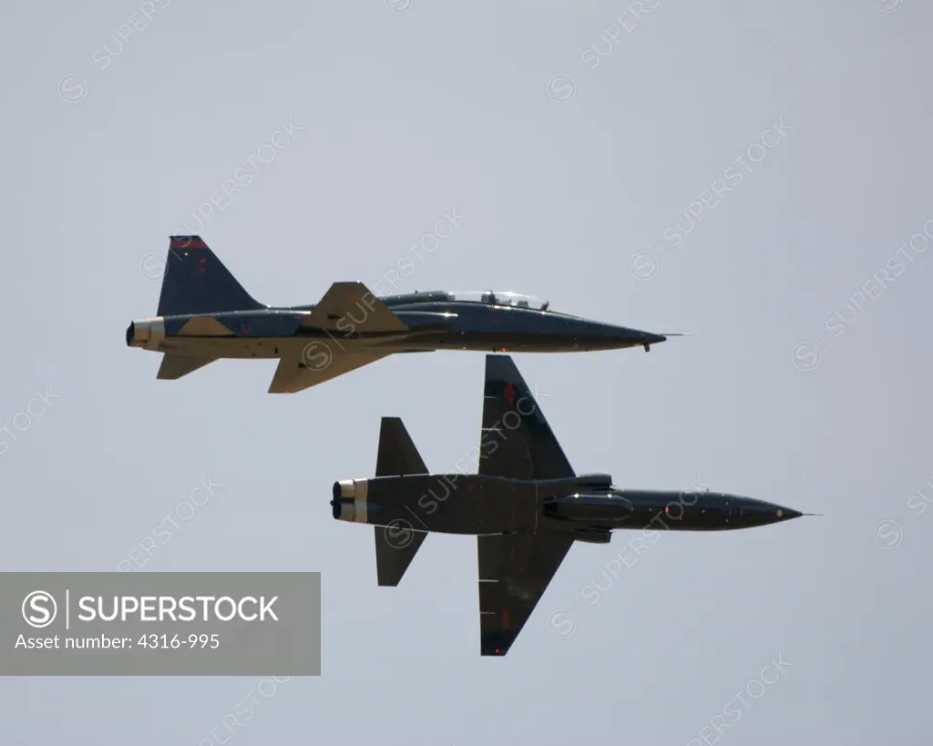 Two T-38s in Tight Formation