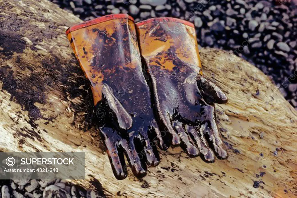 Protective Gloves Covered with Oil