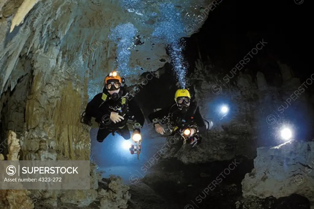 Two Cave Divers in a Cenote in Mexico