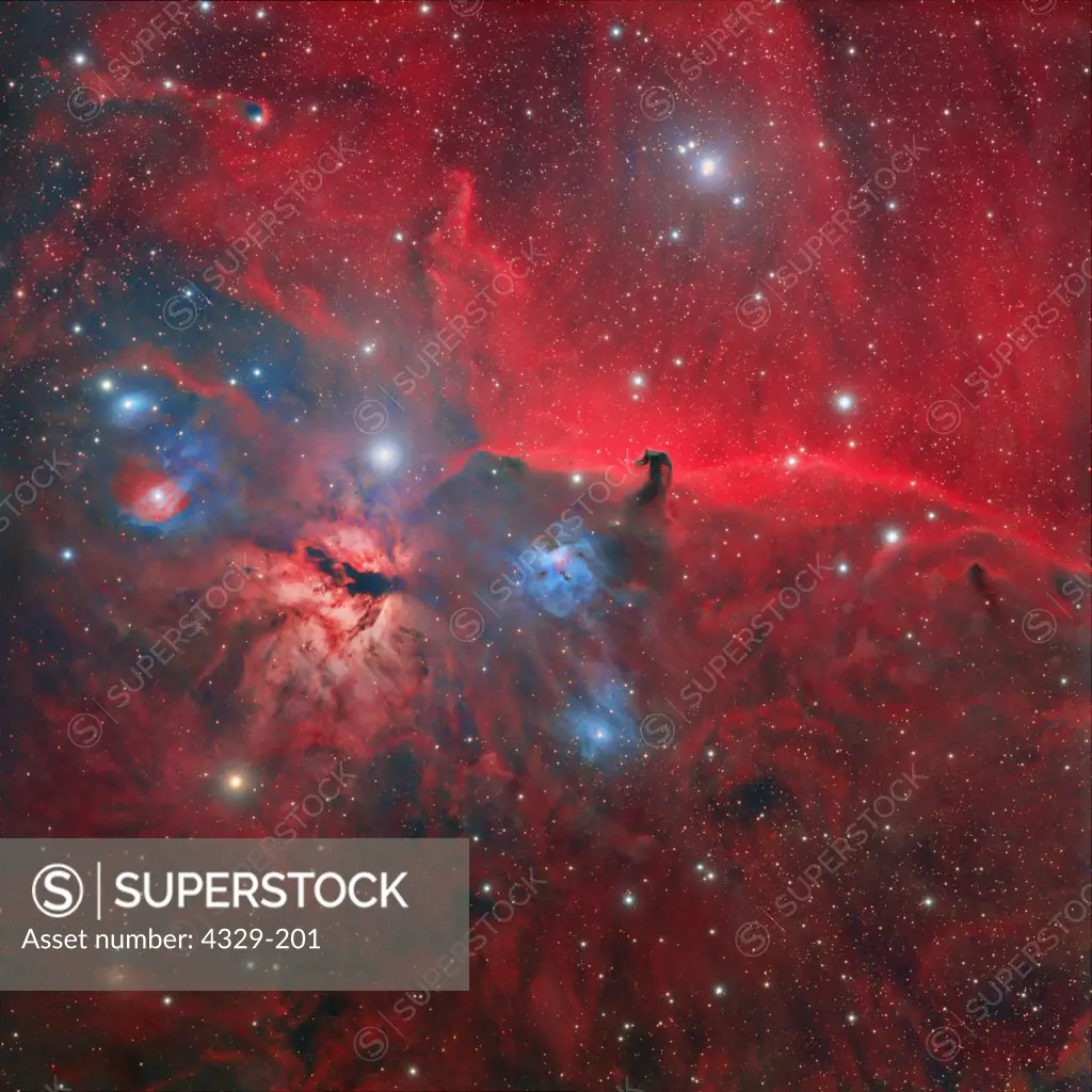 The Horsehead Nebula is located near the 'belt' of three stars in the Orion Constellation. In this deep wide field image we see vast swirls of dust clouds and blue reflection nebulas. The bright nebula to the left of the Horsehead is called the 'Flame Nebula' or NGC 2024. The image was taken with a Takahashi TOA 130 refractor and SBIG STX 16803 CCD camera from Foresthill, CA.