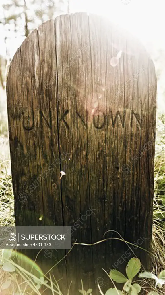 A wooden grave marker in a ghost town in northern Idaho.