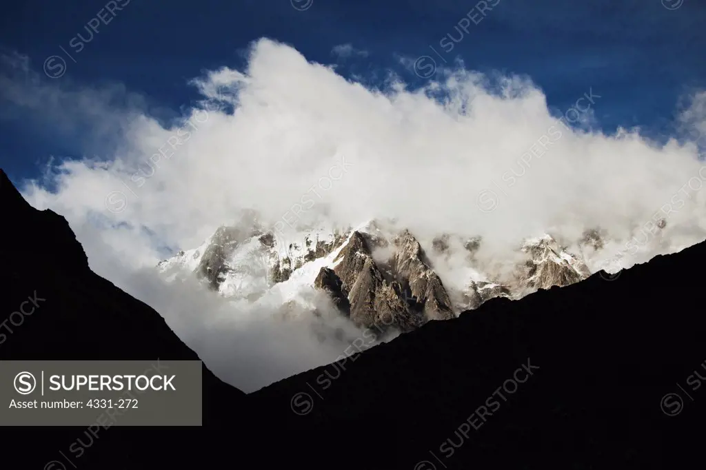 Clouds Wrap Around Jagged Mountain Peaks Along the Salkantay Trail in Peru