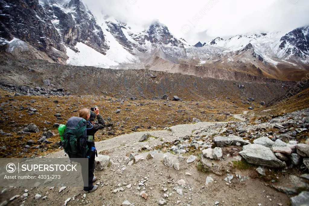 Backpacker Photographs Mountains Near the Salkantay Pass in Peru