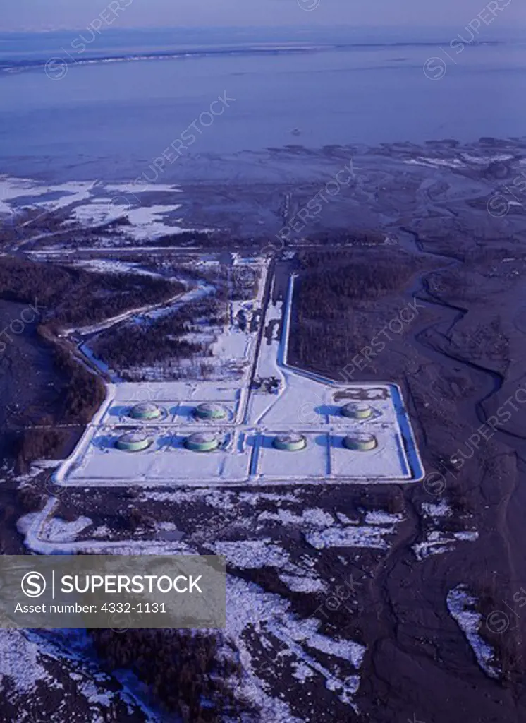 Aerial view of Cook Inlet Pipe Line Company's Drift River Terminal Facility, a tank farm protected by earthen berms, following lahar on the Drift River, April 4, 2009, downstream from Redoubt Volcano, Alaska.