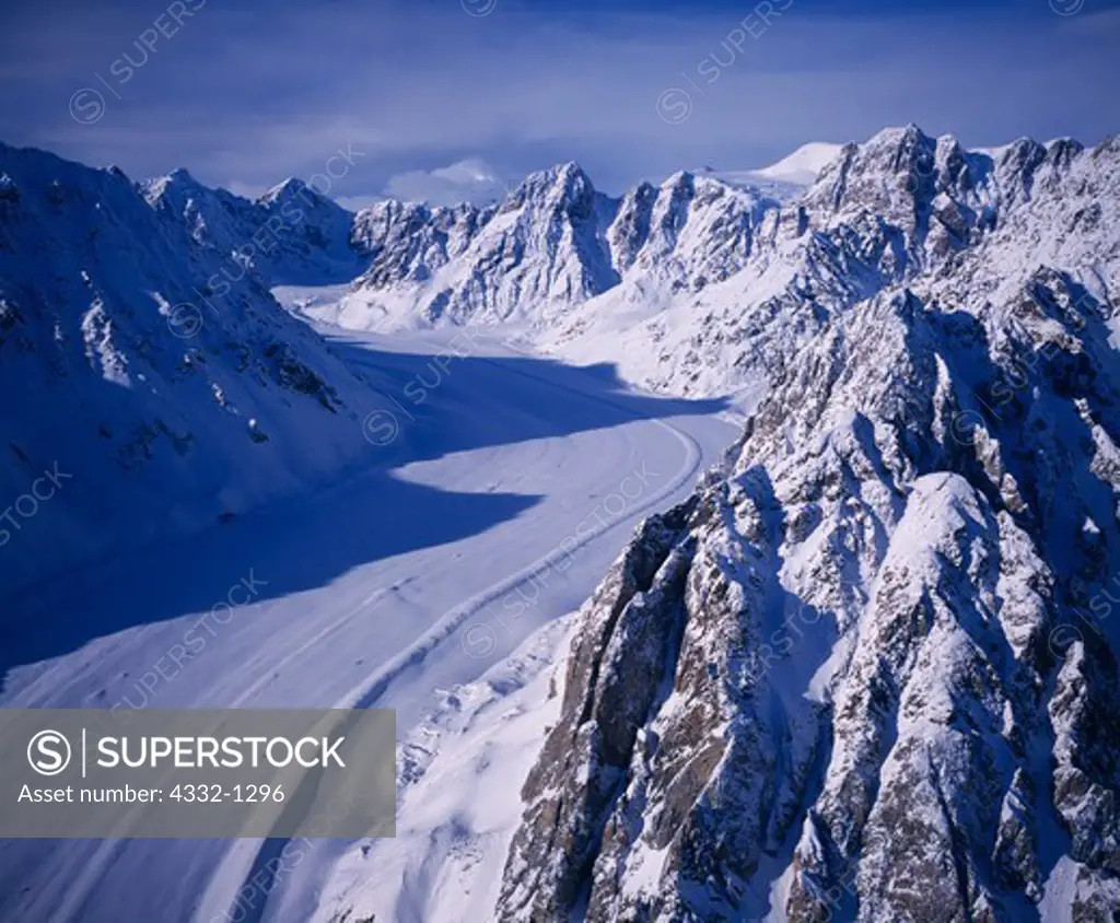 Aerial view in winter of the Bernard Glacier flowing from the Saint Elias Mountains, Wrangell-Saint Elias National Park and Preserve, Alaska.
