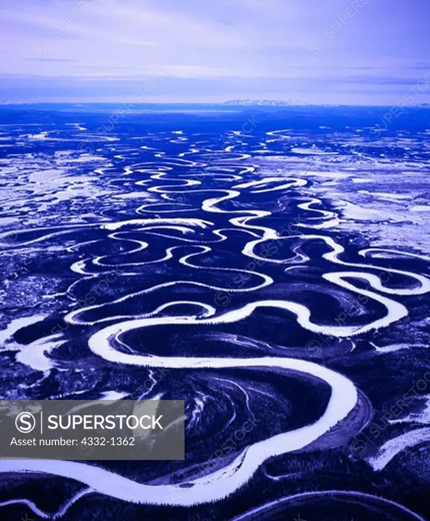 Aerial view in winter of the meandering Big River and associated oxbow lakes east of McGrath, Alaska.