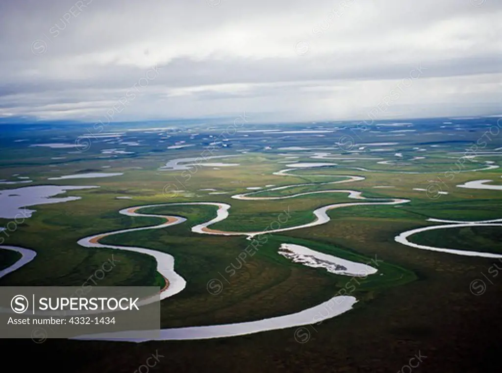 Aerial photograph of the Kuzitrin River meandering over the tundra plains at the west end of Bering Land Bridge National Preserve, Alaska.