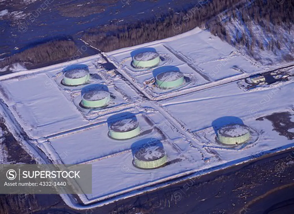 Aerial view of Cook Inlet Pipe Line Company's Drift River Terminal Facility, a tank farm protected by earthen berms following lahar on the Drift River, April 4, 2009, downstream from Redoubt Volcano, Alaska.