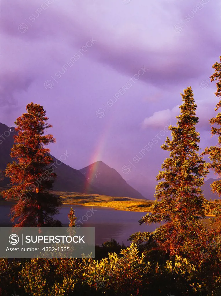 Breaking storm with rainbow, Lower Twin Lake, Lake Clark National Park, Alaska.