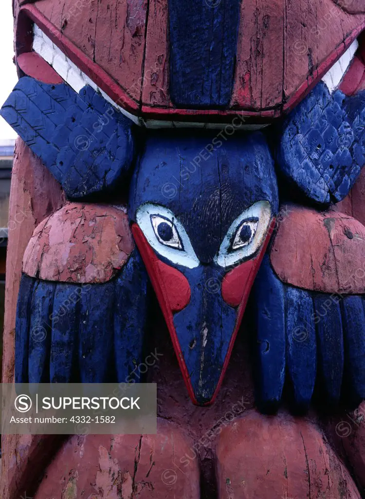 Raven carving on totem pole in Totem Park, Prince of Wales Island, Hydaburg, Alaska.