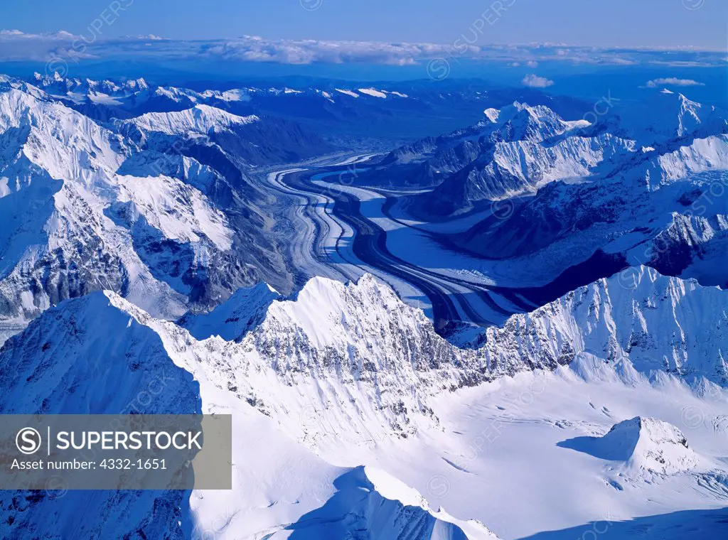 Aerial view of the Yentna Glacier flowing from mountains of the Alaska Range, Denali National Park, Alaska.