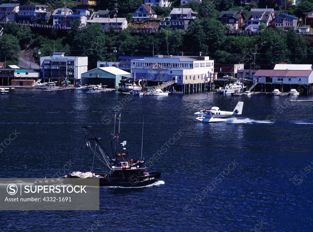 A seiner, the 'Lady Nina,' on Tongass Narrows with the city of Ketchikan beyond, Alaska.