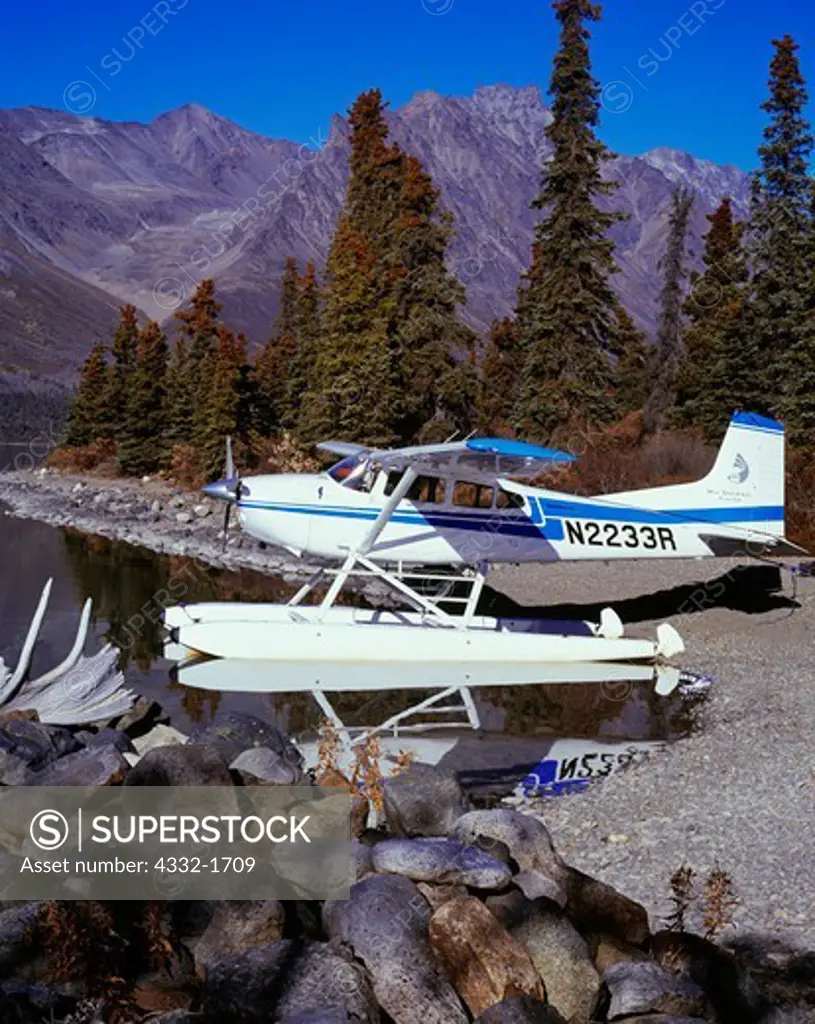 Sky Trekking Alaska's Cessna 185 on floats at Dick Proenneke's Cabin, Upper Twin Lake, Lake Clark National Park, Alaska.