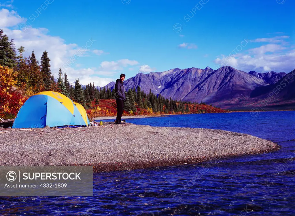 Jason Henrie camped on the shore of Lower Twin Lake, Lake Clark National Park, Alaska.
