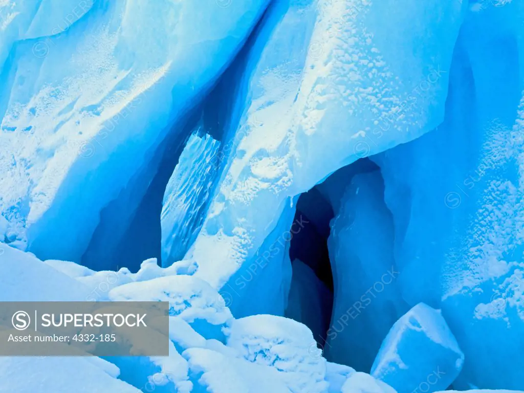 Dual Ice Caves in Massive Iceberg, Chugach Mountains, Alaska