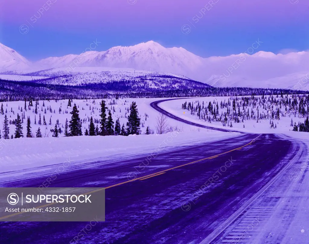 George Parks Highway winding through Broad Pass in winter, Alaska Range, Alaska.