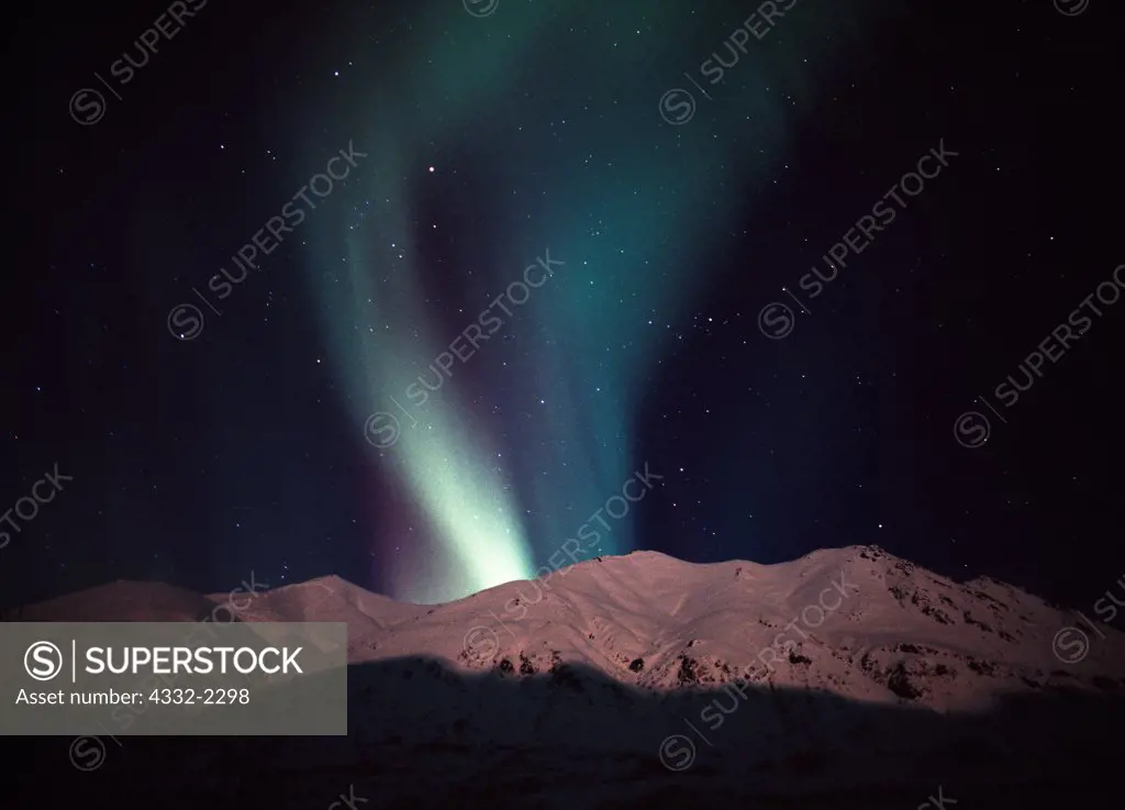Northern lights over the Talkeetna Mountains viewed from Hatcher Pass State Recreation Area, Alaska.