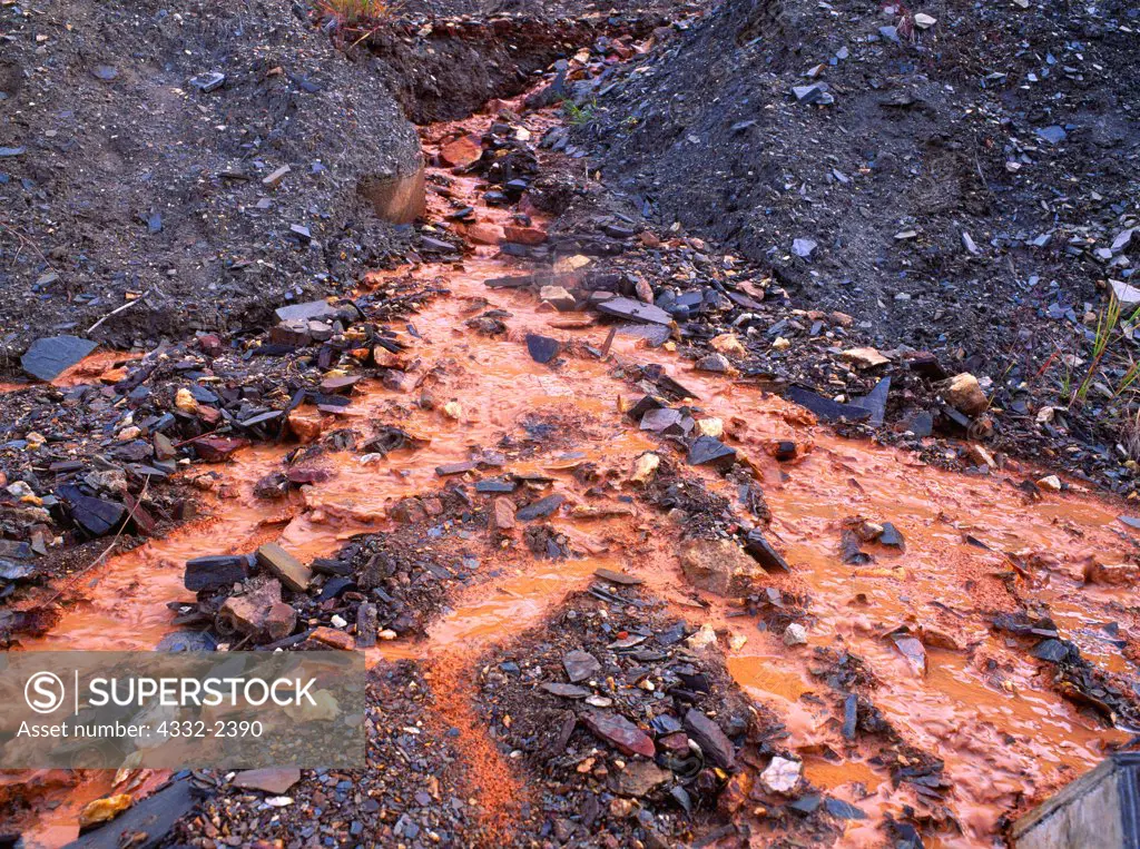 Acid mine drainage from abandoned gold mining shaft, Kantishna Mining District, Denali National Park, Alaska.