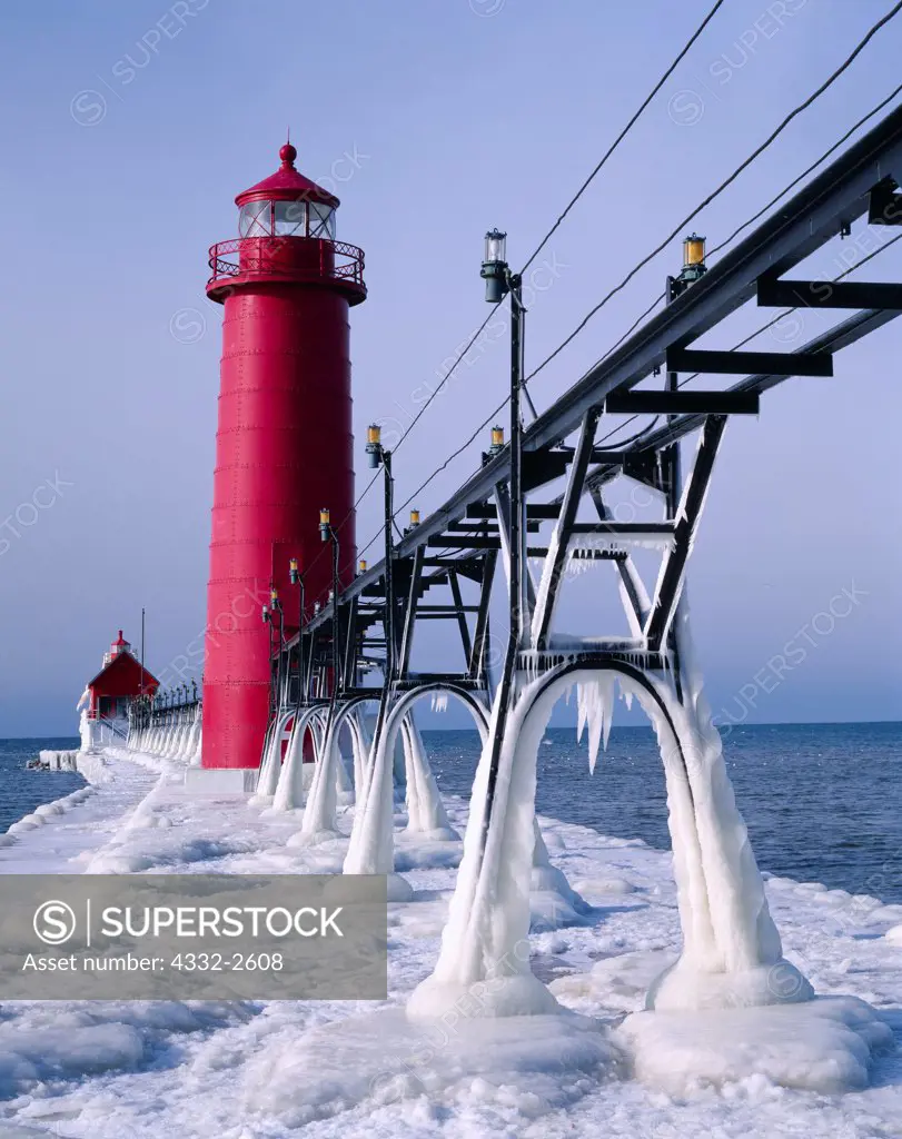 Ice-covered catwalk leading to Grand Haven Inner and South Pierhead Lighthouses, Grand River, Lake Michigan, Grand Haven State Park, Grand Haven, Michigan.
