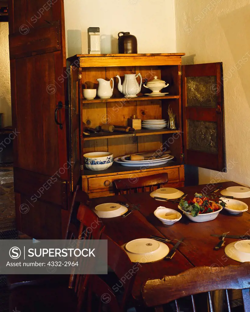 Dining table and cupboard in Jacob Hamblin's Santa Clara Home, Mormon pioneer and missionary, Santa Clara, Utah.
