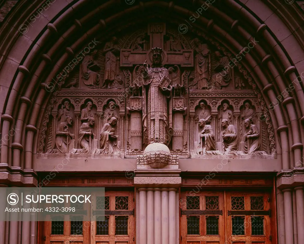 Tympanum featuring Jesus Christ and the Twelve Apostles above main doors of the Cathedral of the Madeleine.  Tympanum designed by Francis Aretz.  Salt Lake City, Utah.