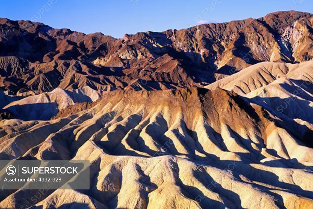 Gully erosion created the badlands of the Furnace Creek Formation south of Zabriskie Point, Black Mountains, Death Valley National Park, California.