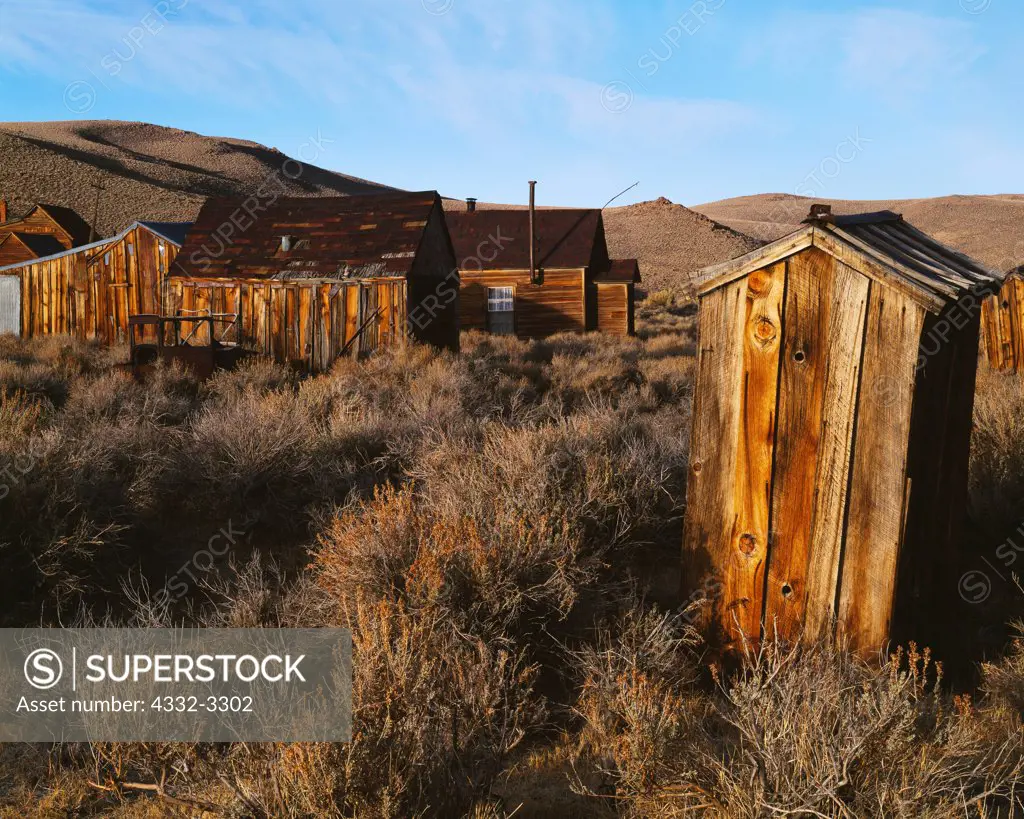 USA, California, Bodie Ghost Town, Outhouse in back lanes of gold mining ghost town at Bodie State Historical Park