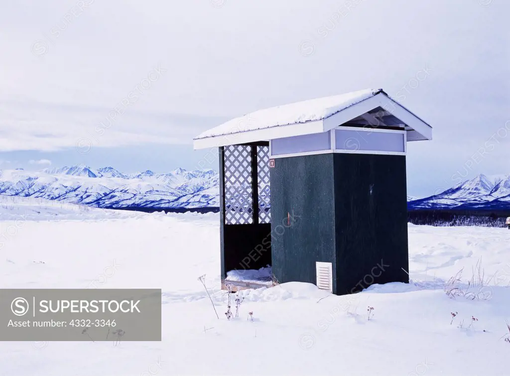 Canada, Yukon Territory, Lonely territorial outhouse near Beaver Creek
