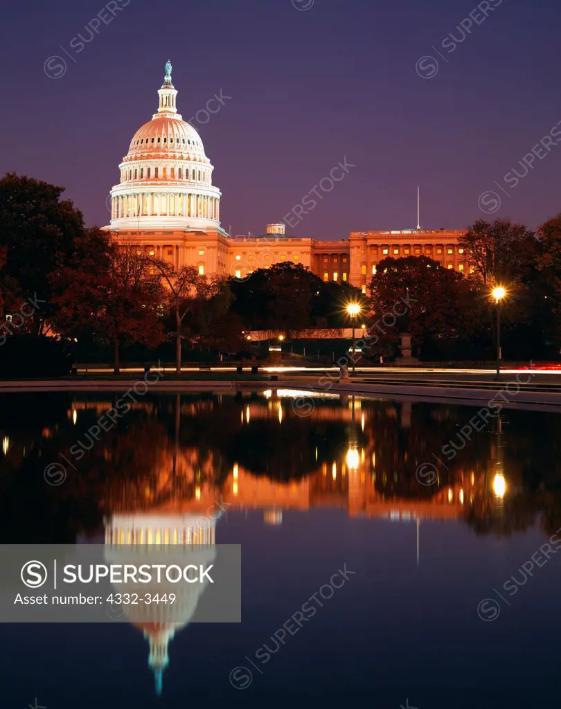 USA, Washington, Washington DC, United States Capitol Building at dusk with reflecting pool in foreground