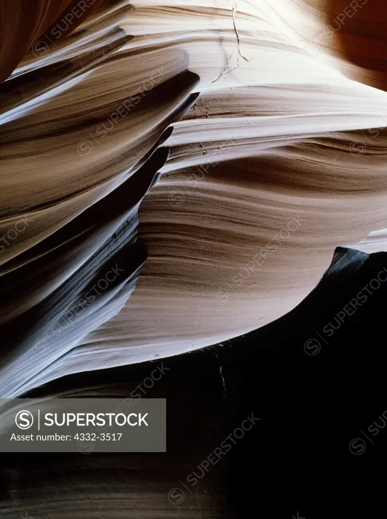 USA, Arizona, Fluted Navajo Sandstone wall deep within slickrock slot canyon