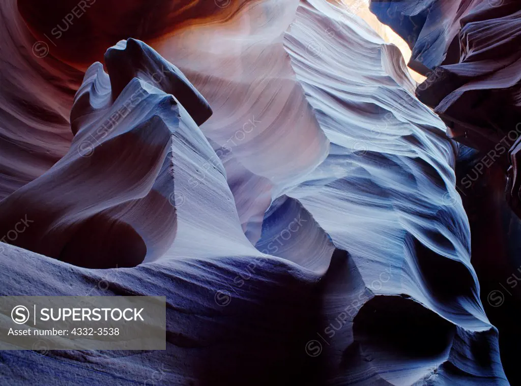 USA, Arizona, Colorado Plateau, Natural alter in hallowed chambers of slickrock slot canyon