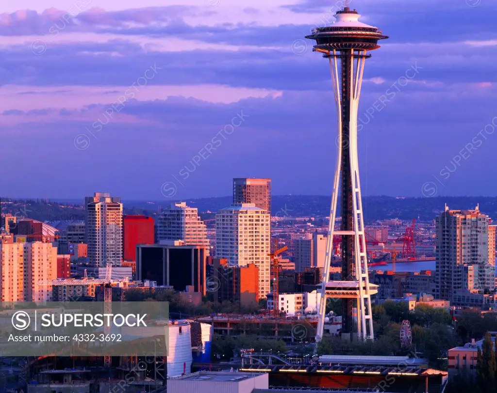 USA, Washington, Seattle, Sunset light illuminating 605-foot-tall Space Needle and skyline