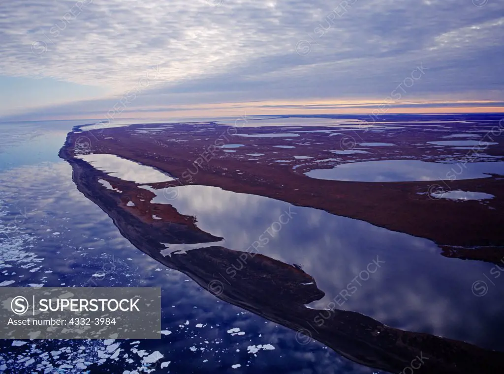 Aerial photograph of Arctic Ocean coastline between Point Belcher and Point Franklin, National Petroleum Reserve in Alaska.